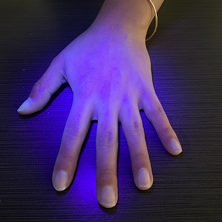 Glo Germ is not visible on hand after 20 seconds of washing.
