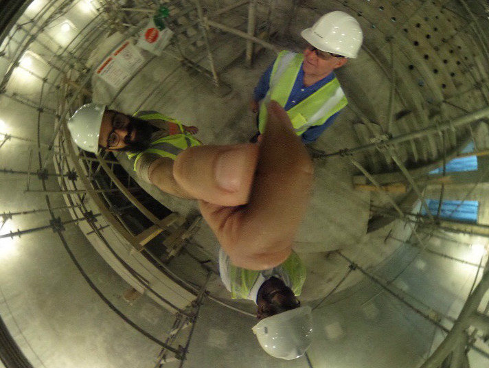 Dr. Jorge Perez-Gallego and friends exploring the inside of the Frost Planetarium mid-construction