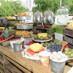 Collection of different foods and fruits for an event