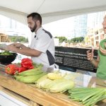 Demonstrator and chef presenting ingredients