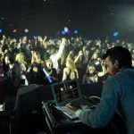 DJ performing for a large crowd