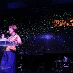 Woman presenting at a science event