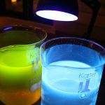 Solids aren’t the only state of matter that demonstrate fluorescent qualities with ultraviolet light—certain liquids do too! The beaker on the left contains tap water and fluorescein; the beaker on the right holds tonic water with quinine (an antimalarial).