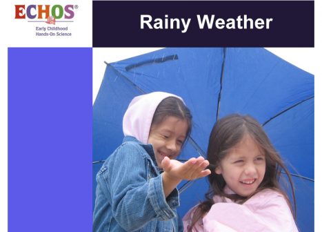 Young girls holding an umbrella in the rain