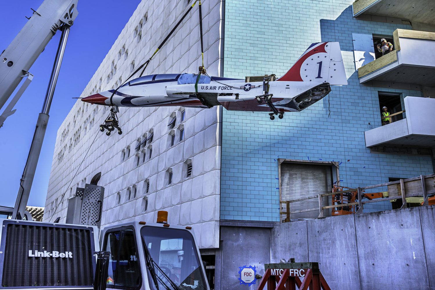 Large plane being lifted into a museum