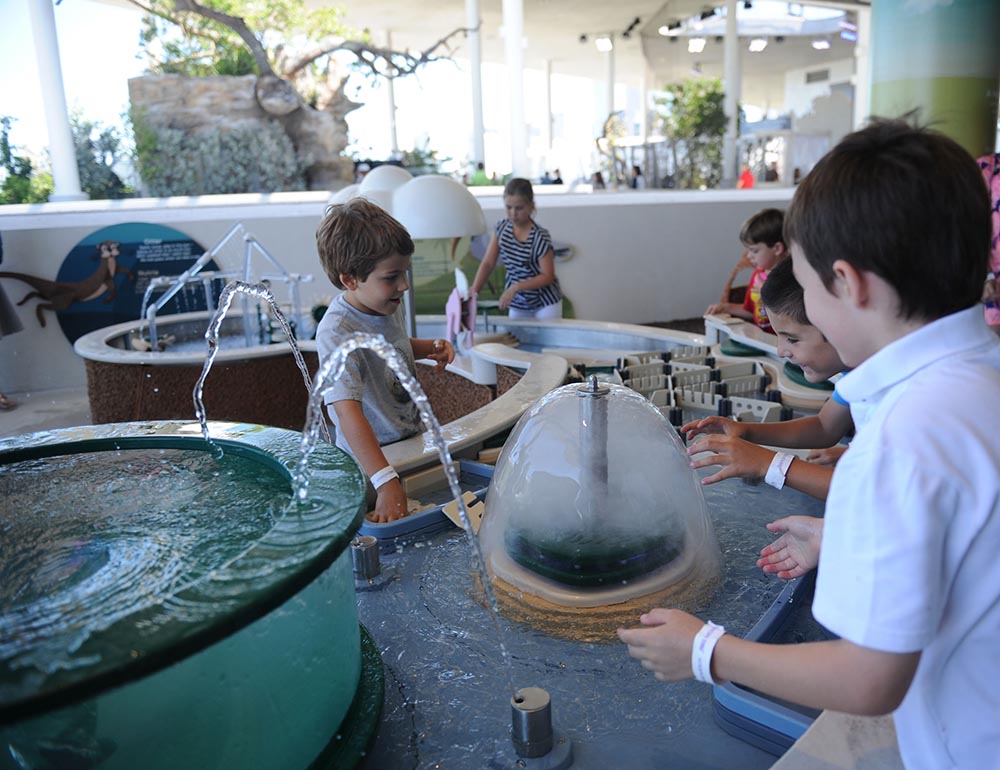 Children playing with Water Tables