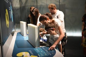 family-learning-about-brain-exhibit