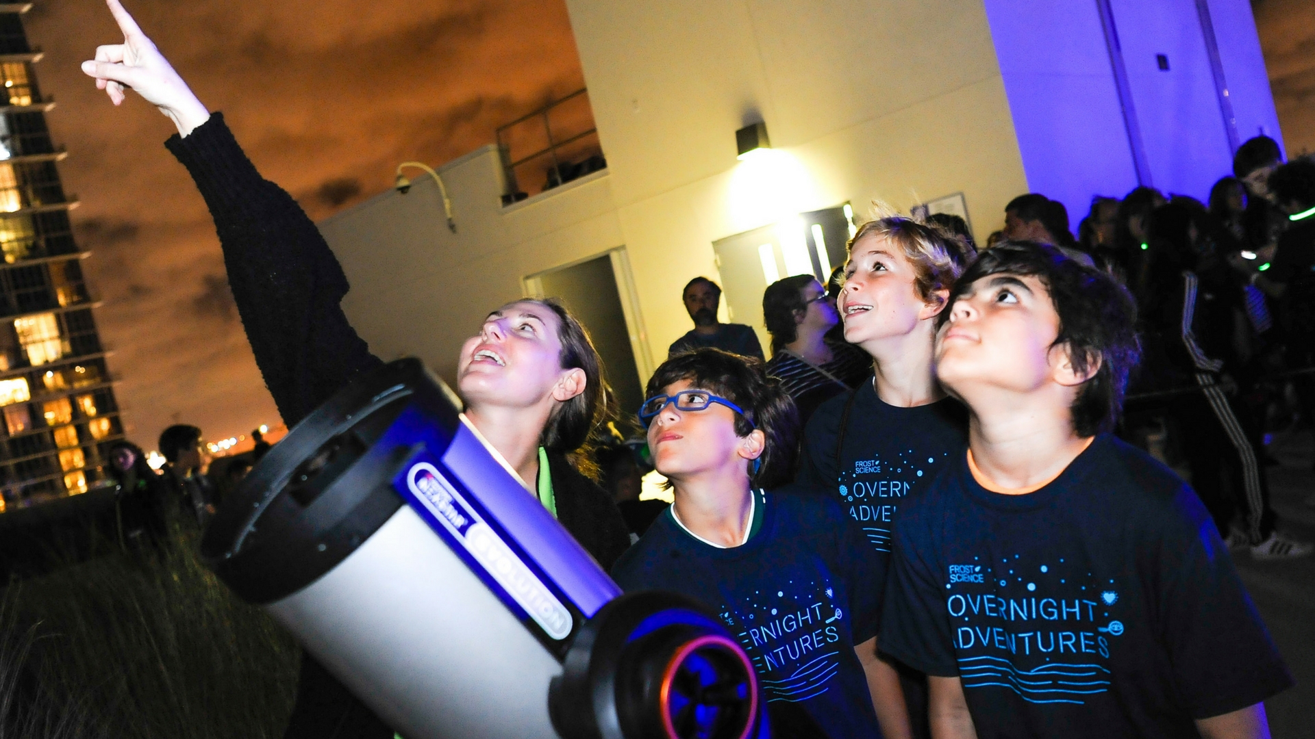 photo of kids stargazing during overnight adventures