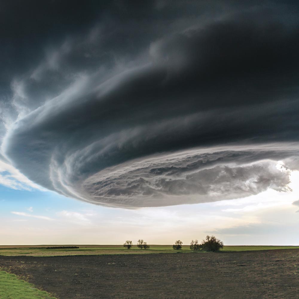 An ominous storm cloud hovers over a field in eastern Colorado. While these stunning “mother ships” can spawn tornadoes, this one didn’t.