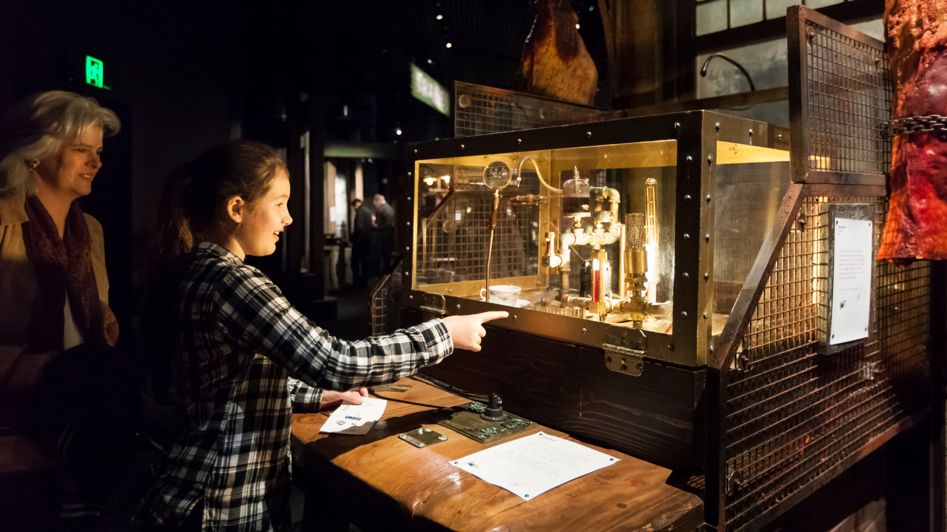Young girl pointing at Sherlock Holmes: The Exhibition